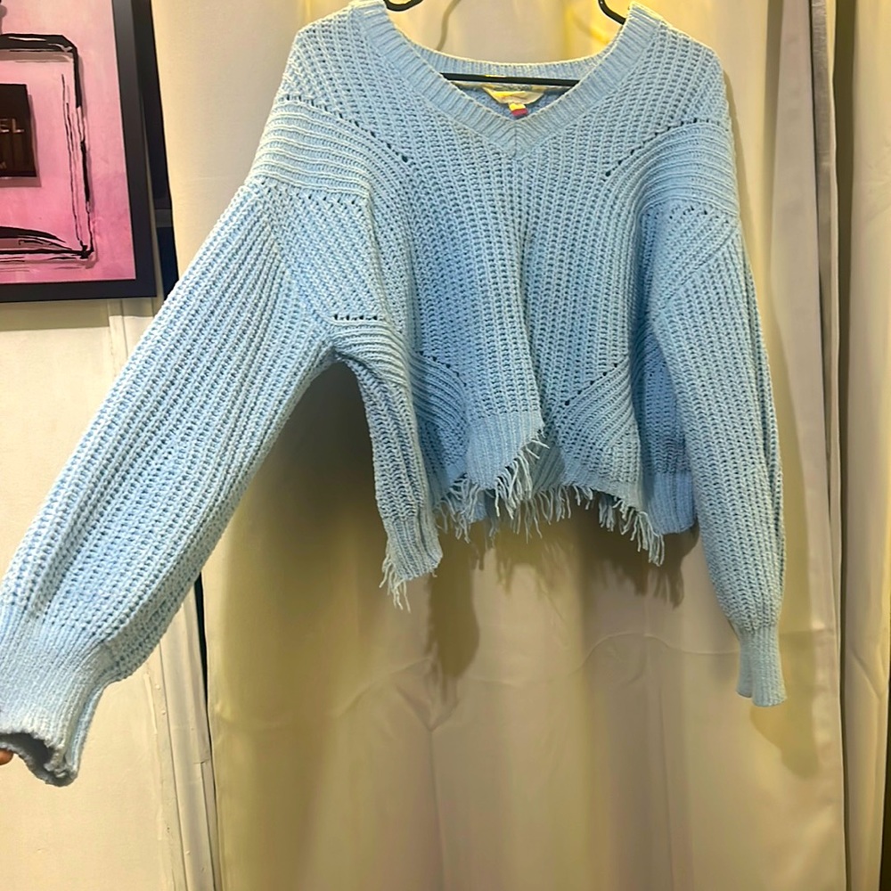 Light blue cropped sweater.